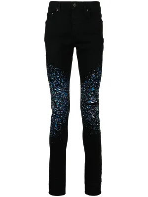 Amiri paint splatter-print skinny-cut jeans