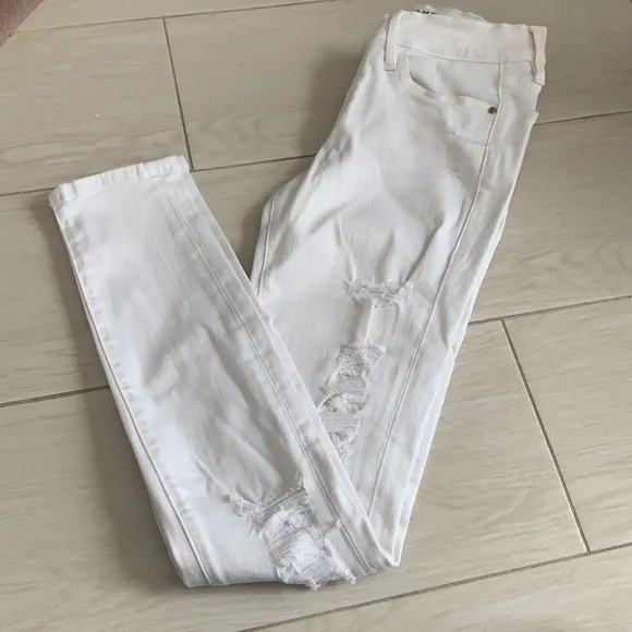 Frame Le Skinny De Jeanne ripped white jeans