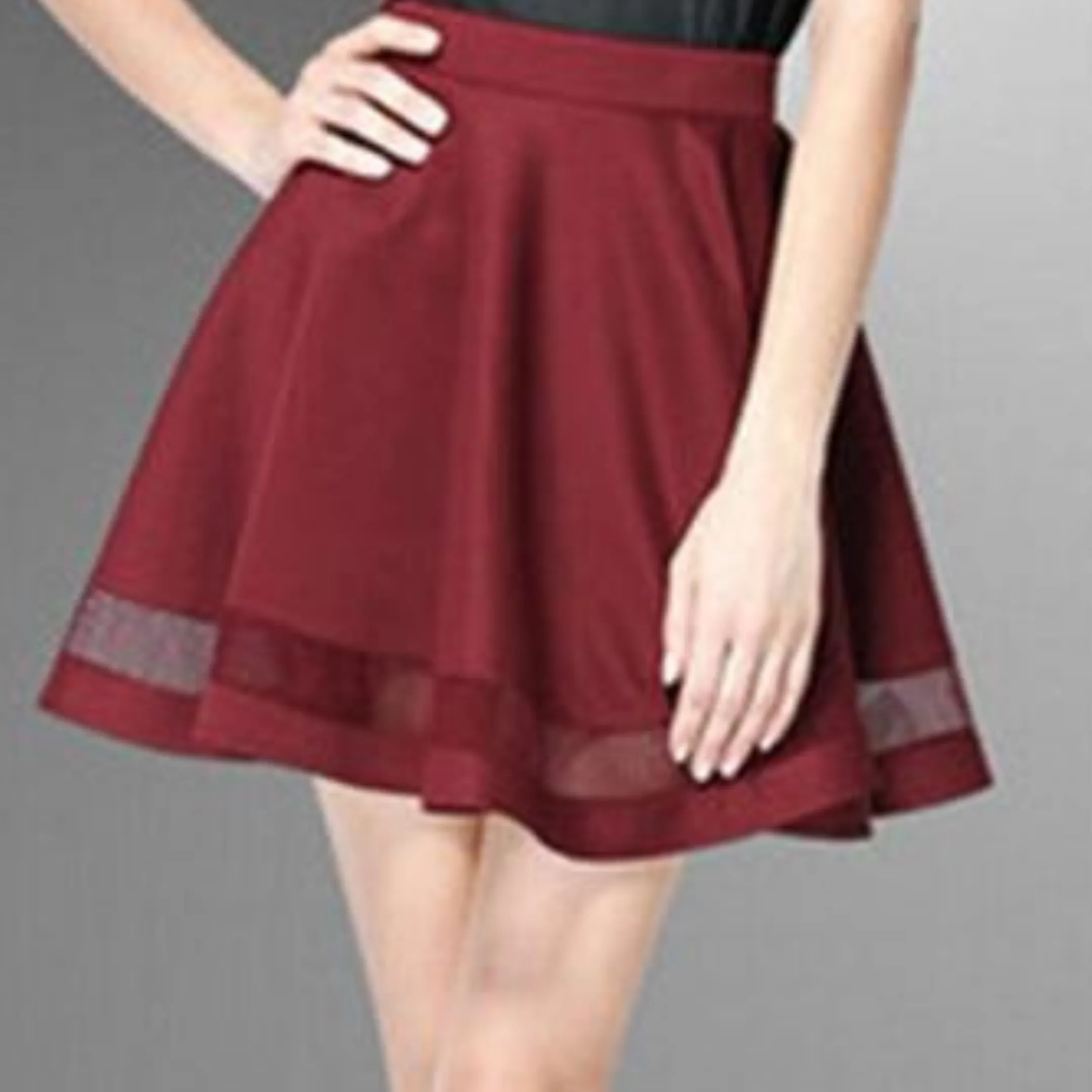 Mini skirt with mesh inserts