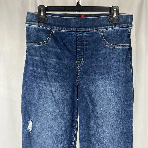 SPANX Distressed Ankle Skinny Jeans in Medium Wash.