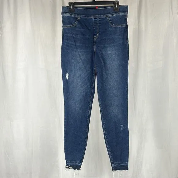 SPANX Distressed Ankle Skinny Jeans in Medium Wash.