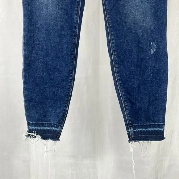 SPANX Distressed Ankle Skinny Jeans in Medium Wash.