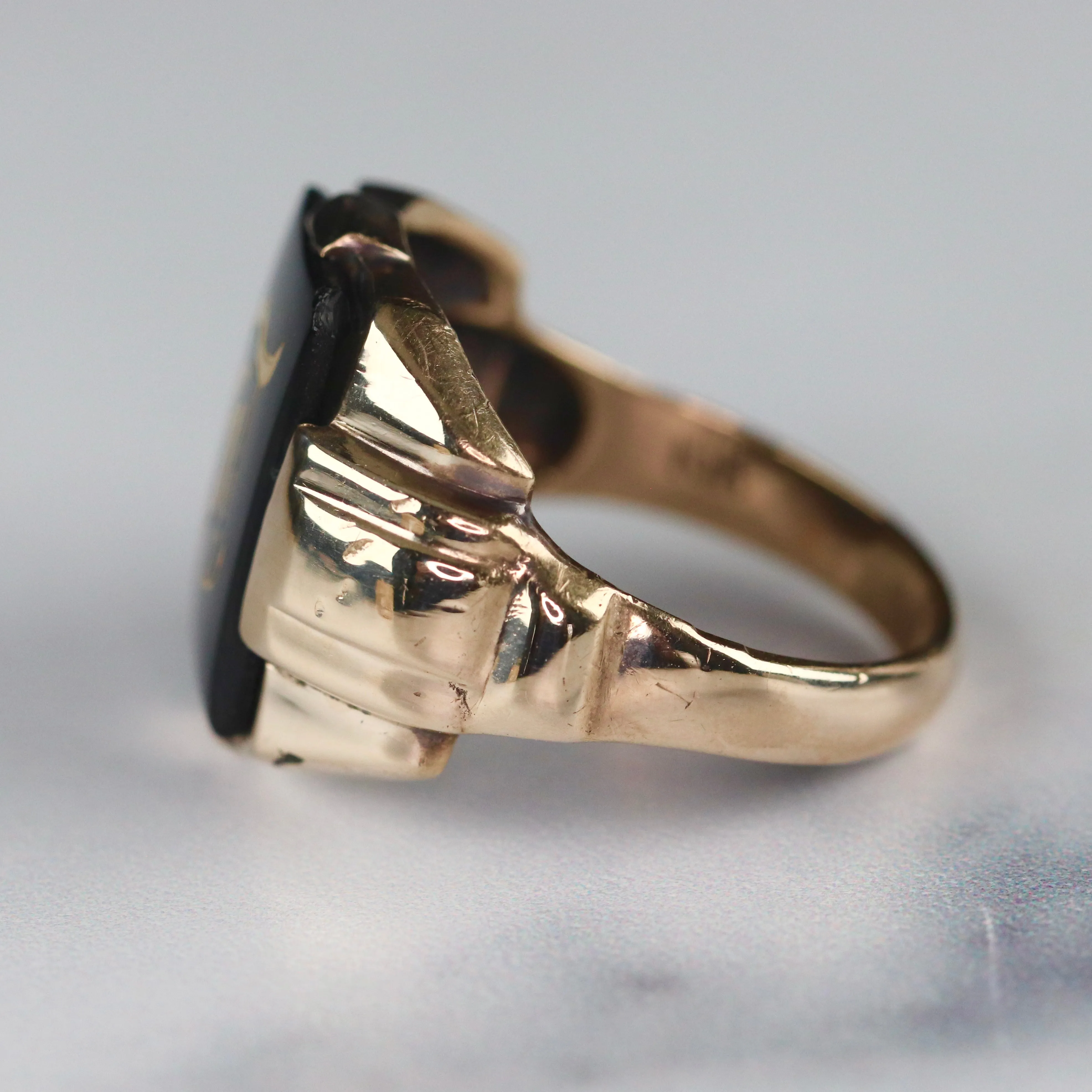 Vintage onyx letter T ring in yellow gold