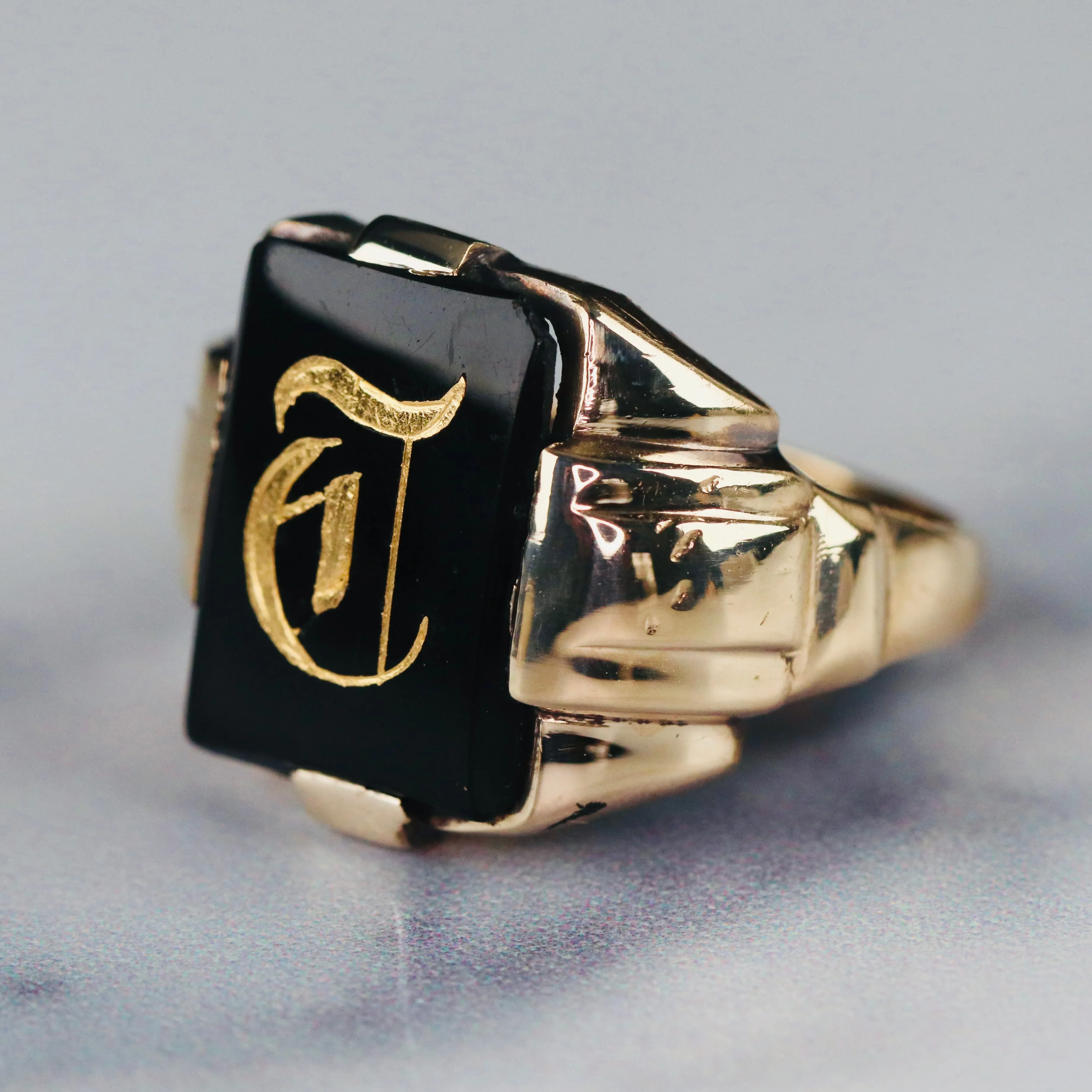 Vintage onyx letter T ring in yellow gold