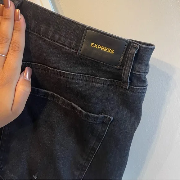 Women’s EXPRESS black distressed skinny high rise jeans size 12R