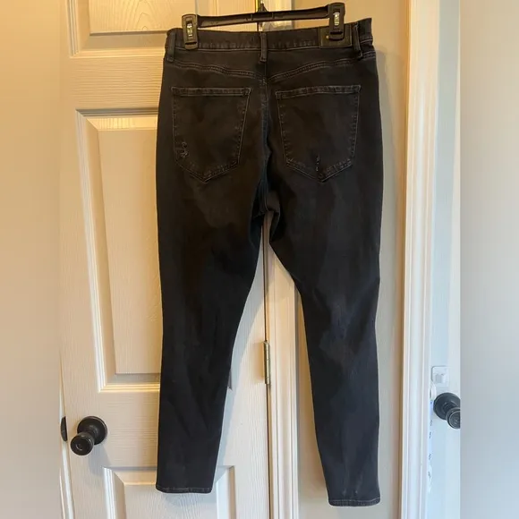Women’s EXPRESS black distressed skinny high rise jeans size 12R